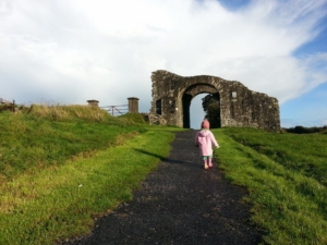 Little R, exploring a castle in Trim, Ireland.
