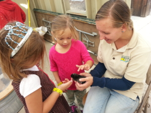 L and her BFF, petting a baby chicken on the class field trip.
