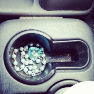 Necklace in a cup holder, 2014.